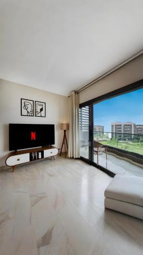 Madinaty Apartment | شقة فندقية هادئة بأطلالة بانوراما على الحديقة