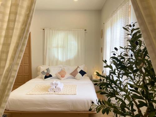 Trat House | อุ่นไอดิน Home Stay