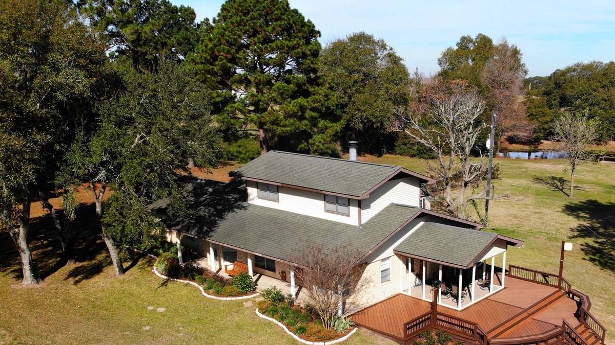 Bellville House | 100-acre ranch with beautiful creek, ponds, woods, livestock