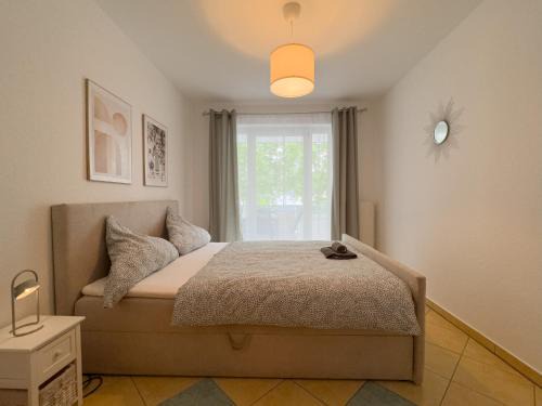 Wesertor Apartment | 110qm - 4 Zimmer - privat Parkplatz - zentral - Balkon - MalliBase Apartments