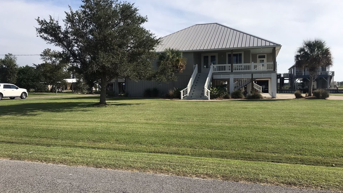 Hackberry House | 200 feet on the water with boat house!