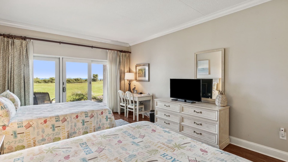 Fernandina Beach Condo | 256 Sandcastles Beautiful Oceanfront, Ground Floor Hotel Room & Private Patio