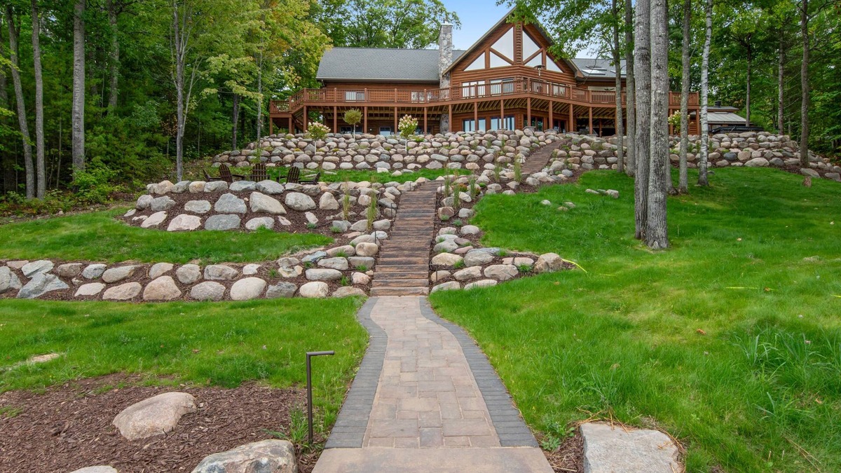 Lac du Flambeau House | 3-story chalet with private hot tub, game room & waters toys - dog-friendly