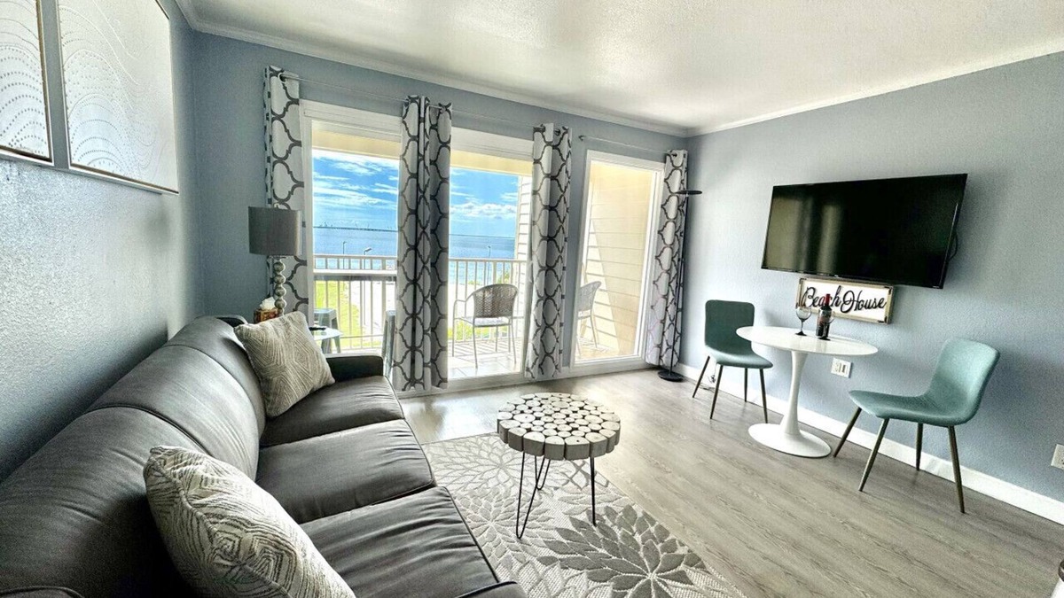Rocky Point Apartment | 311 · Sophisticated Waterfront Getaway: Pool, Balcony, and Serene Views