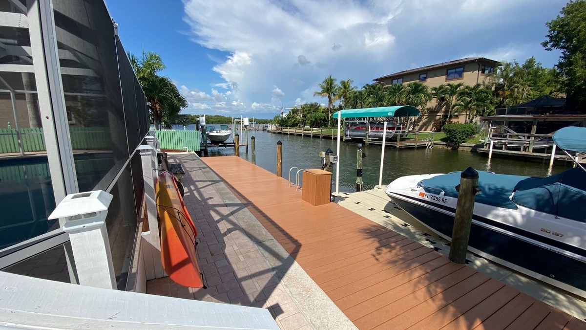 Mid Island House | 390 Bayland Rd - Tropical Bayfront Home with Pool by the Beach!