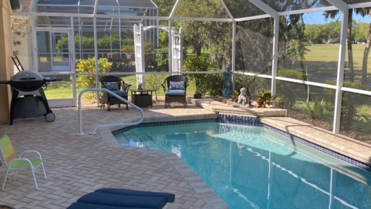 Imperial Lakewood's House | 4 Bedroom house with a heated pool on a public golf course