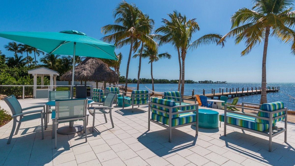 Coral Cove Condo | 4 BR Ocean front Condo in Islamorada, FL Keys steps away from pool & sandy beach