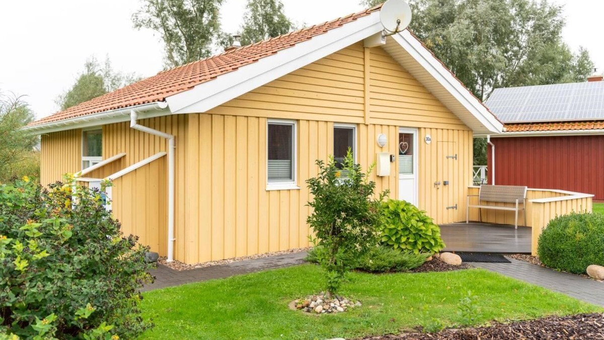 Norderteil House | 4 person vacation home with sauna, wood-burning stove and a beautiful garden with terrace in Otterndorf
