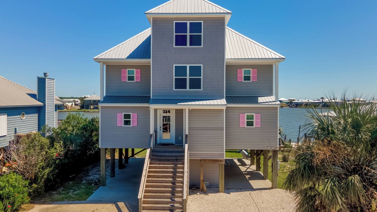 Royal Lagoons House | 5 Bedroom Home on Laffite Bay! Short walk to the beach!