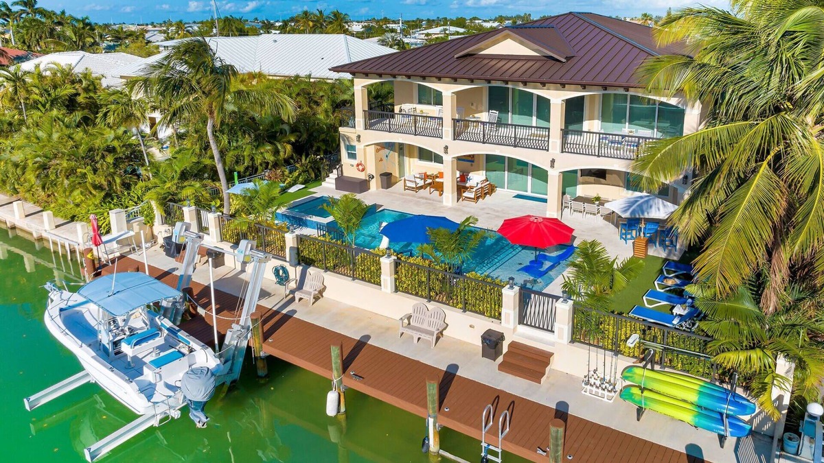 Key Colony Beach House | 5 bedrooms, pool/spa heated, bikes, kayaks, game room, elevator, deep 75' dock.
