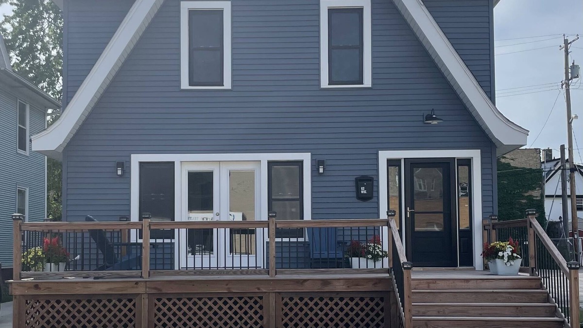 Historic Downtown Racine Apartment | 5 Minutes from Downtown Racine. Private deck, entrance, and driveway.