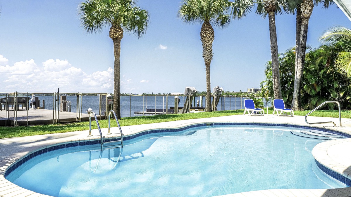 Fort Pierce House | 5BR/4.5B Beach House- heated pool, deep water dock, walk to beach!