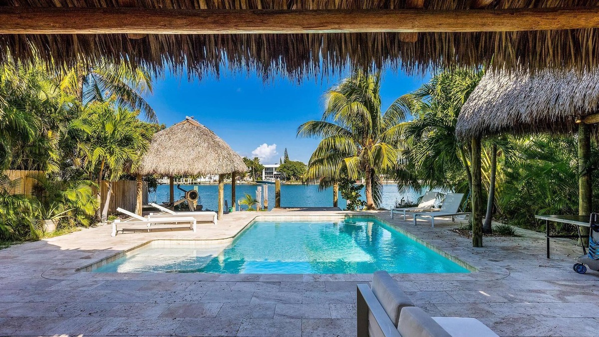 Keystone Point House | 5BR Beautiful Luxury waterfront home with heated pool!