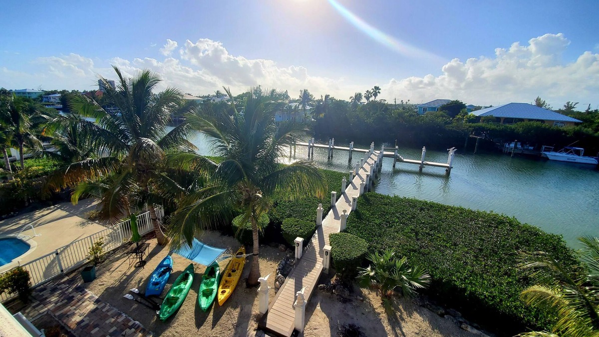 Marathon House | 5BR luxury home w/pool, theater, rooftop deck & 100-ft dock near beach!