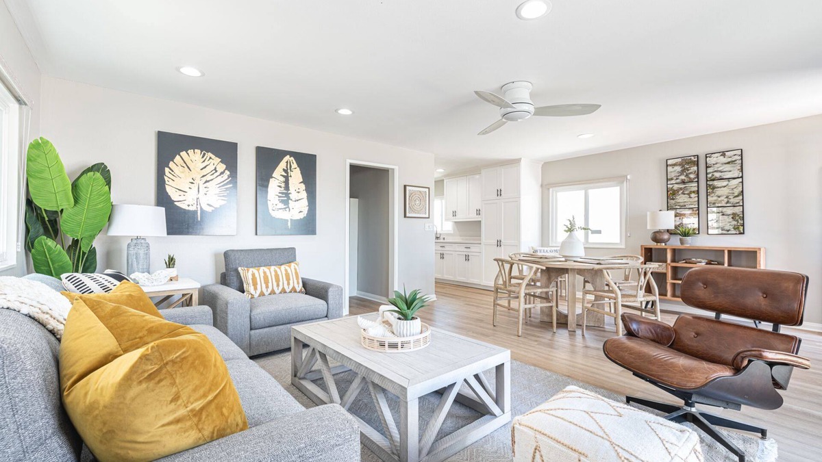 Balboa Peninsula Condo | 6 Total Bedrooms | Modern Interior w/3 Large Patios | Central Location 1 House from the Beach - No Car Needed!