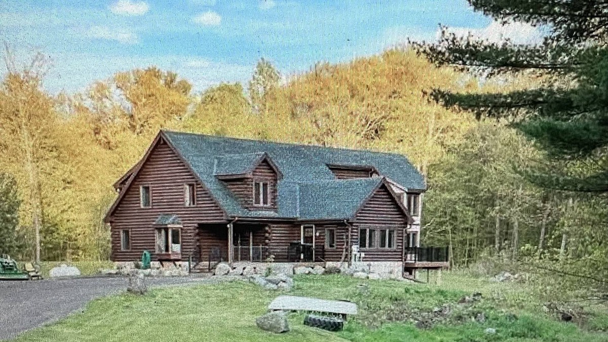 Amery Cabin | 6000 sqft Log Cabin - Nestled on 53 acres -ski out access. 10 min from the lake!