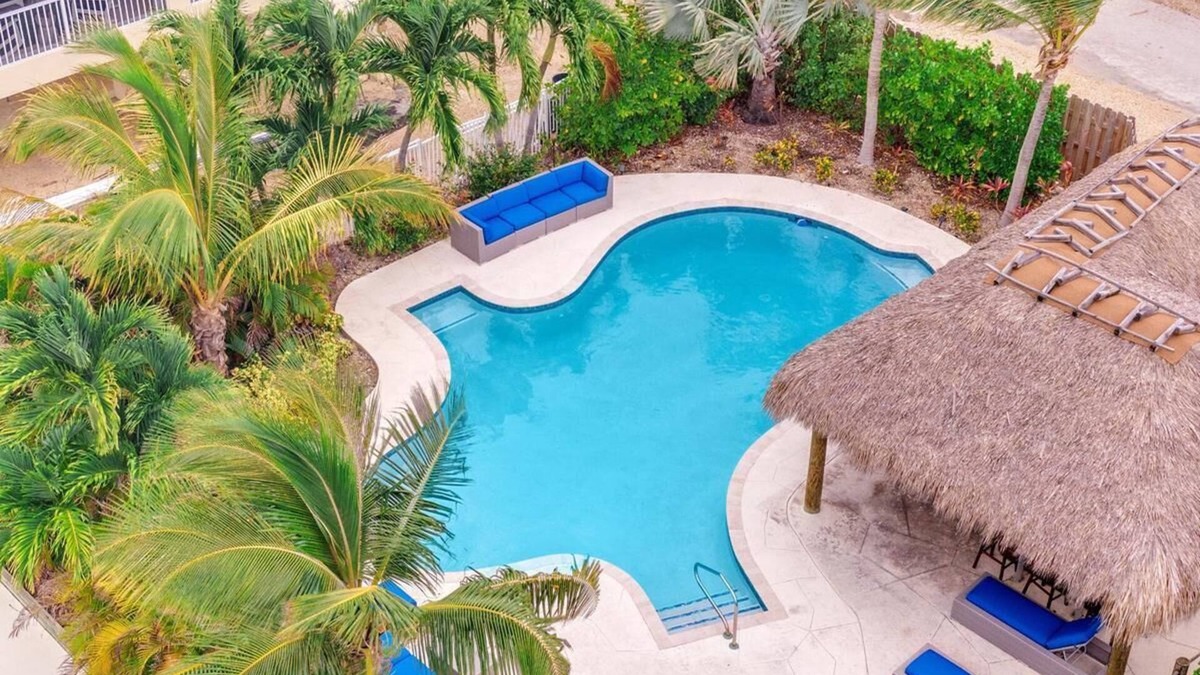Marathon House | 6BR/6BA Pelican's Nest: Oceanfront Home With Pool, Tiki Bar, and 150' Boat Dockage