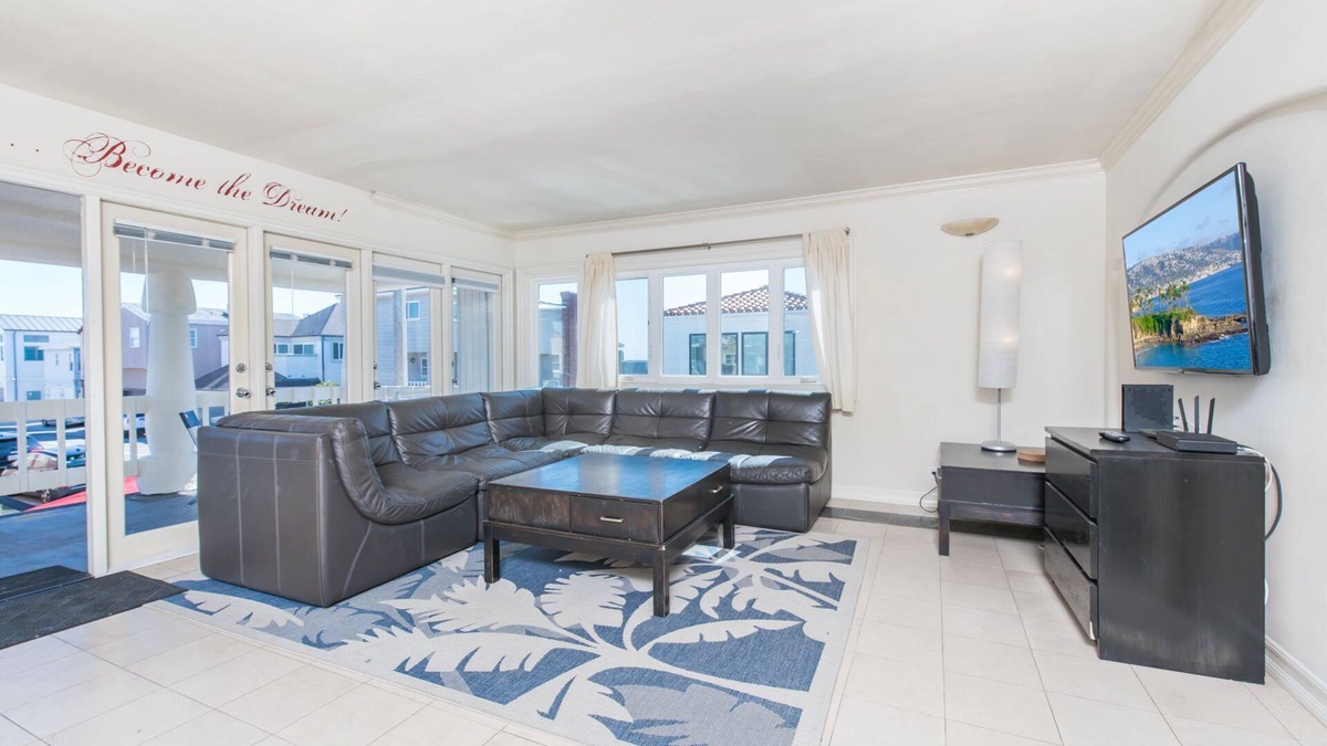 West Newport Condo | 7BR Vacation Home Steps to the Sand!