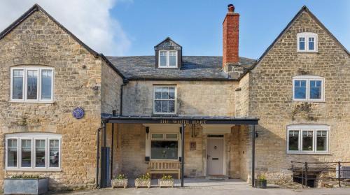 King's Stanley House | A handsome large 9 bedroom 17th Century village house moments from The Cotswold Way offering modern luxury in a peaceful location