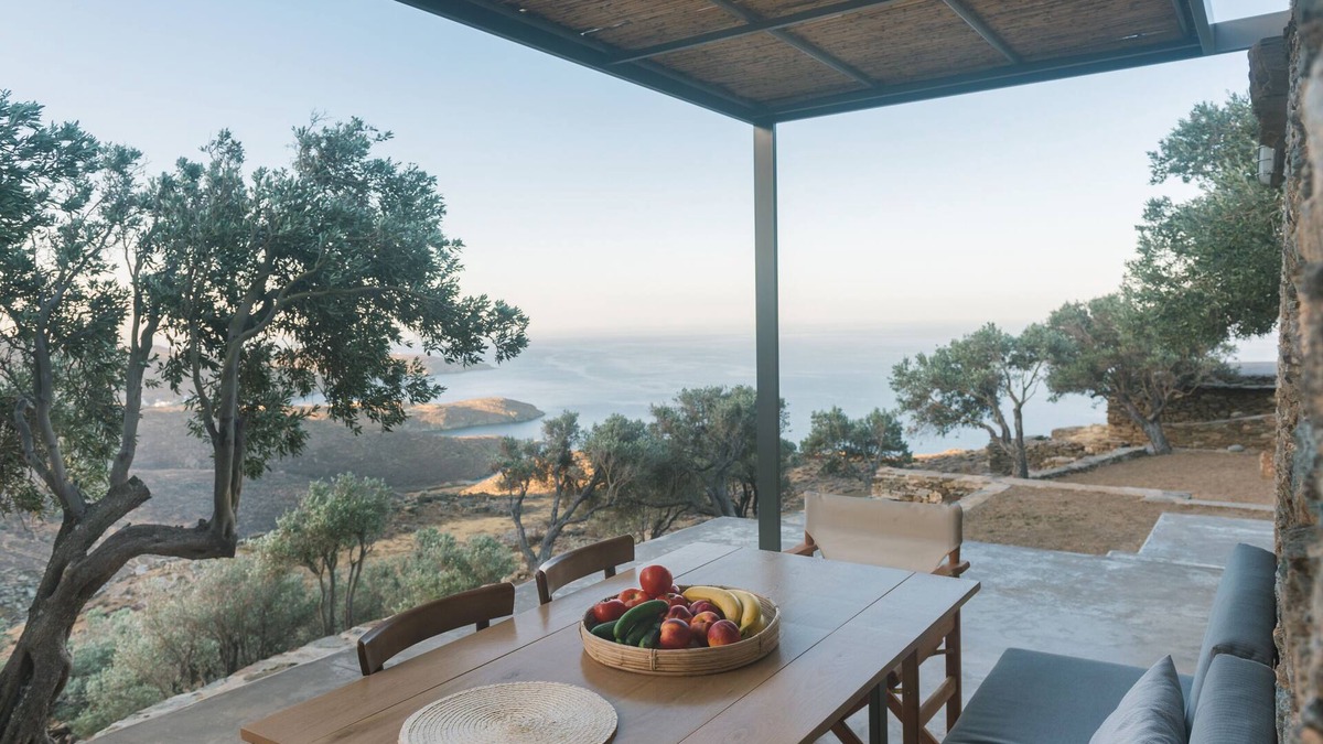 Exomvourgo House | A house in an olive grove with a unique view to the Aegean sea.