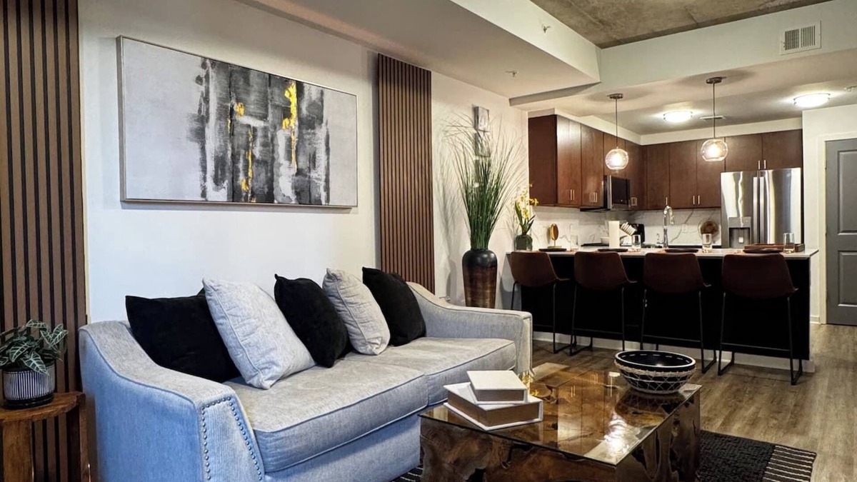 Midtown Apartment | A Place of Peace: Discover serene comfort in a peaceful retreat! This centrally located property provides easy access to top corporations, popular attractions, stadiums, & dining hotspots.