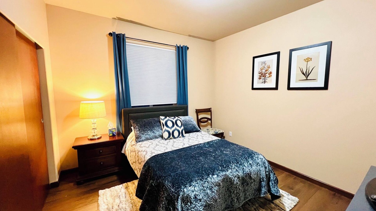 Lacey House | A private bedroom with AC in a quiet neighborhood