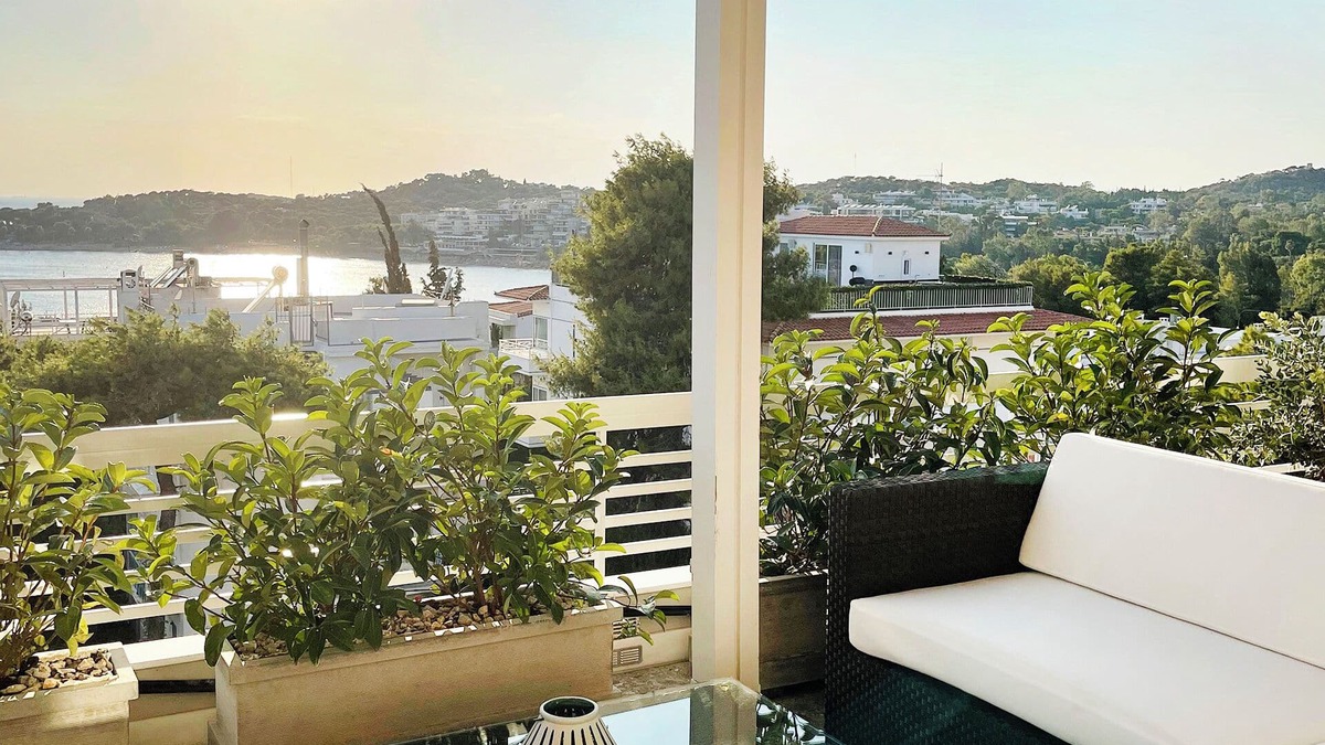Vouliagmeni Apartment | A unique 3 level penthouse with a great sea view to Vouliagmeni Bay