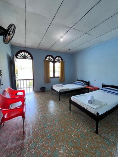 Tuk Tuk House | Abadi Guest House Tuktuk