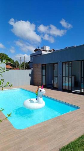 Campo d'Aviacao House | Aconchegante casa de Madeira com linda área lazer!