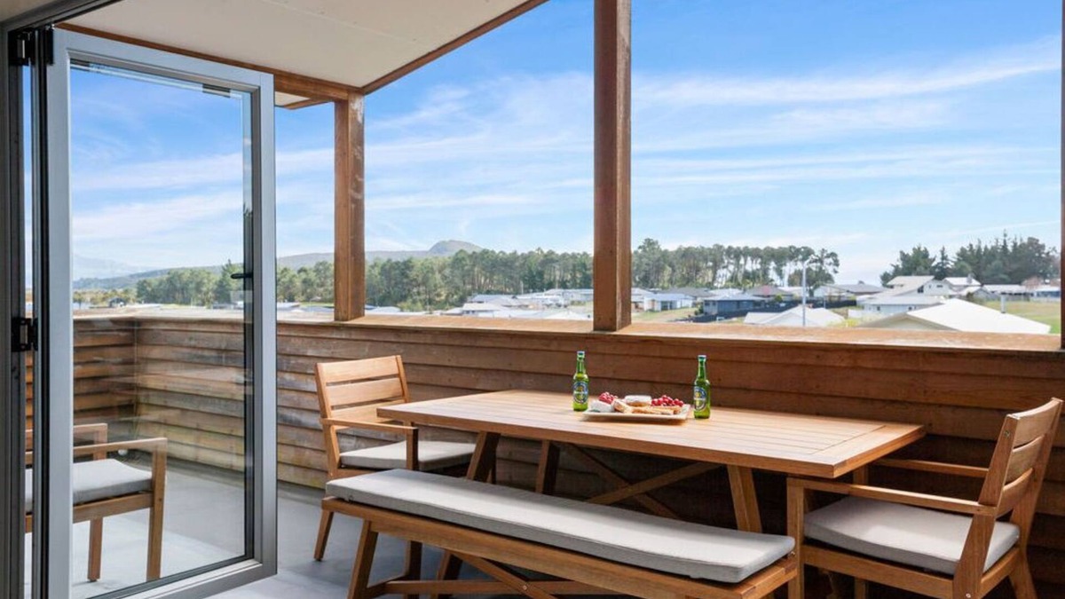 Motuoapa House | Adventure Sika - Relax on the deck with views