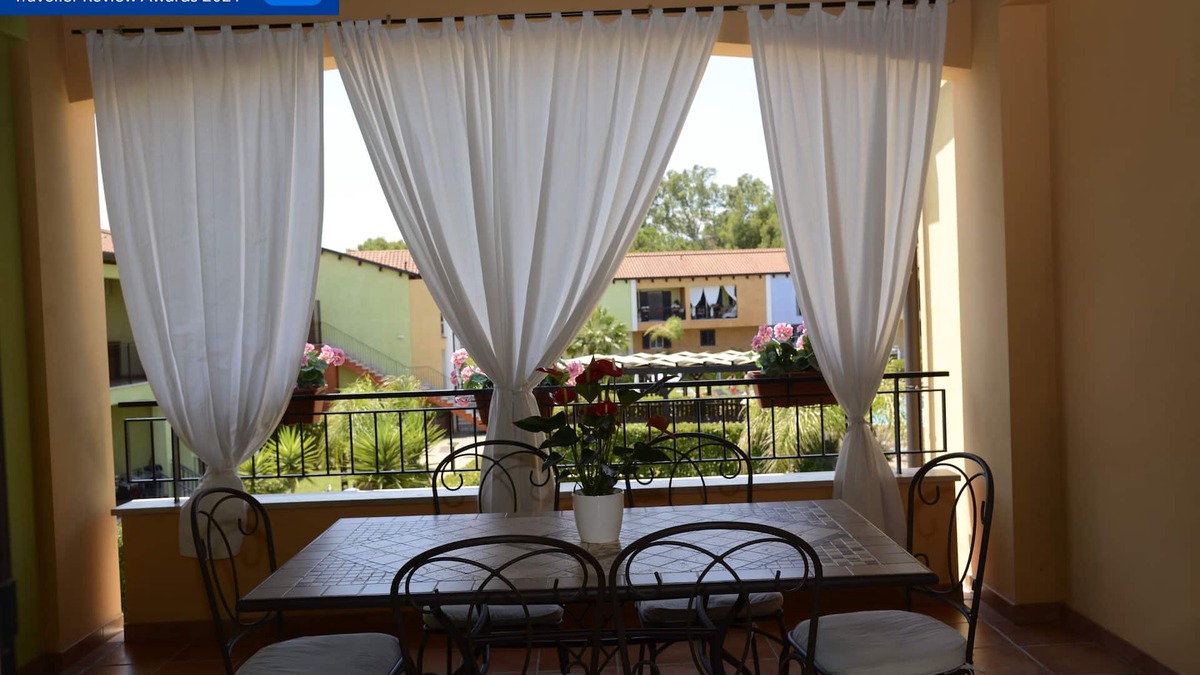 Lido Condo | AFRODITE-Elegant villa overlooking pool.