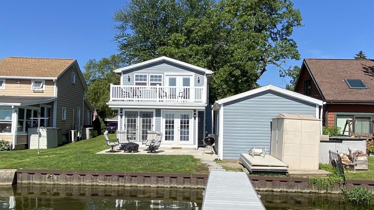 Manitou Beach-Devils Lake House | Airy, updated family cottage on all-sports lake