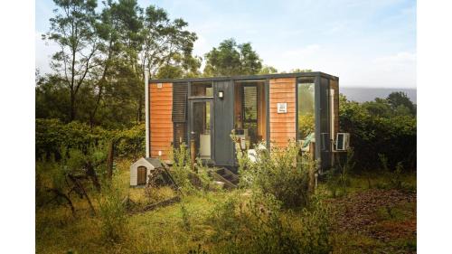 Flowerdale House | Alpaca Tiny House with Vineyard Lakeside by Tiny Away