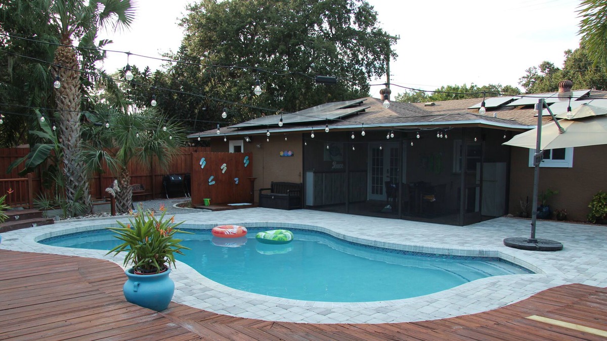 Crooked Creek House | Amazing home with heated pool, tiki bar and luscious outdoor close to beaches