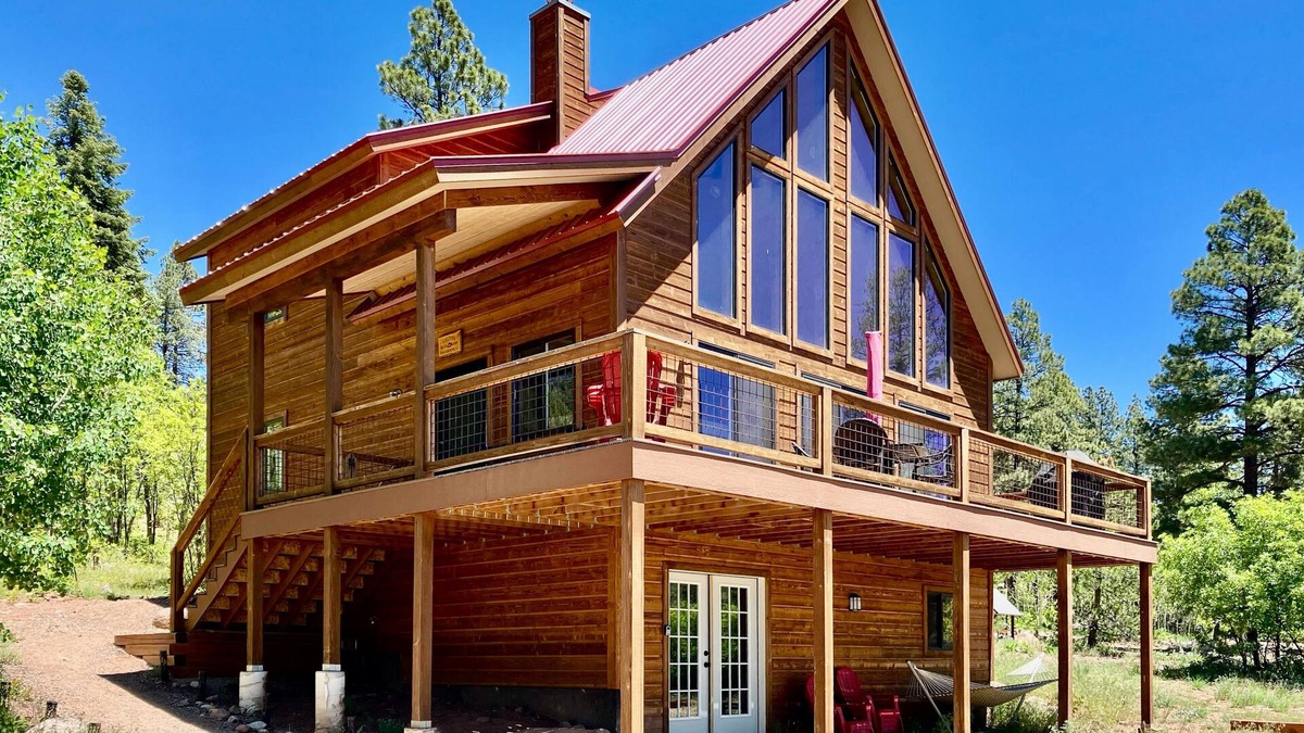 Bayfield House | Amazing lake view home with fireplace, W/D, kitchen, grill, balcony, and deck