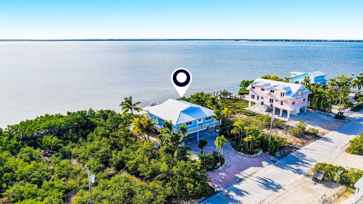 Cutthroat Harbor Estates House | Amazing waterfront home with private beach, dock, pool, WiFi & outdoor kitchen