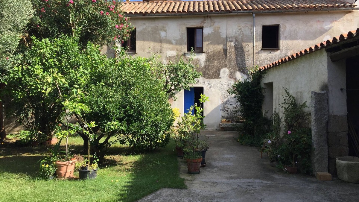 Guspini House | Ancient house with garden - sea, relaxation and vacation/Casa Terra - IUN P7085