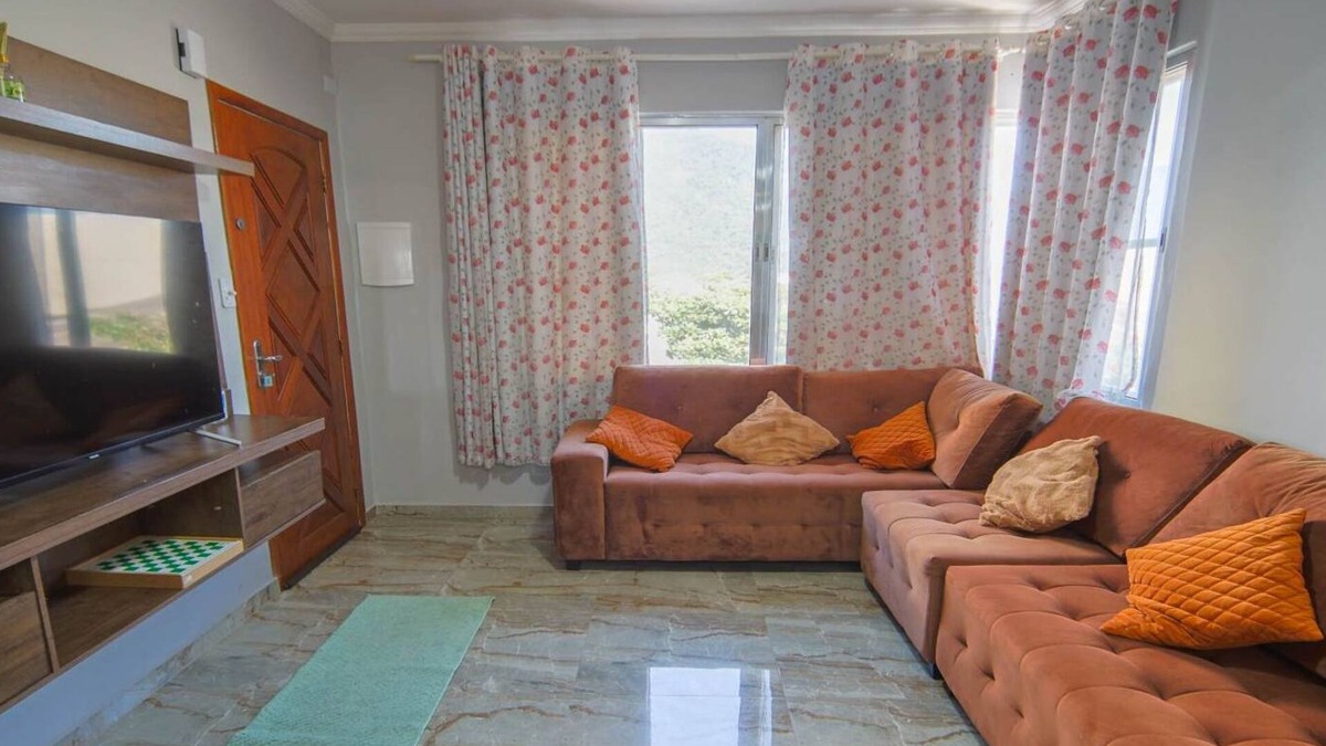 Centro Apartment | Apartamento em Peruibe frente mar com garagem