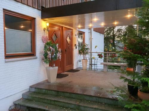 Buchholz in der Nordheide Apartment | Apartment bei Hamburg bis 10 Personen mit Terasse und Gartennutzung.