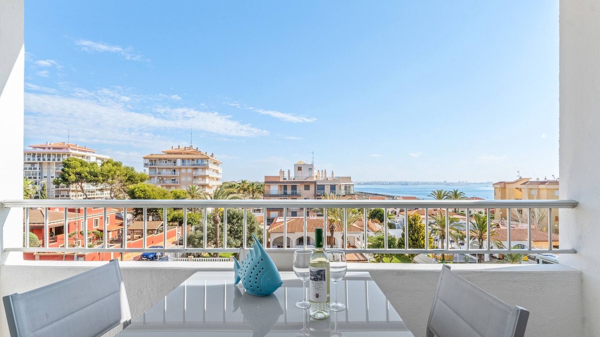 Punta Prima Apartment | Apartment 'Beach Front Sea View Punta Prima' with Sea View, Wi-Fi and Air Conditioning