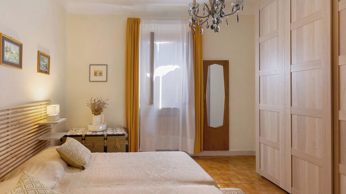 Albisano Apartment | Apartment 'Corbei' with Lake View, Shared Terrace and Wi-Fi