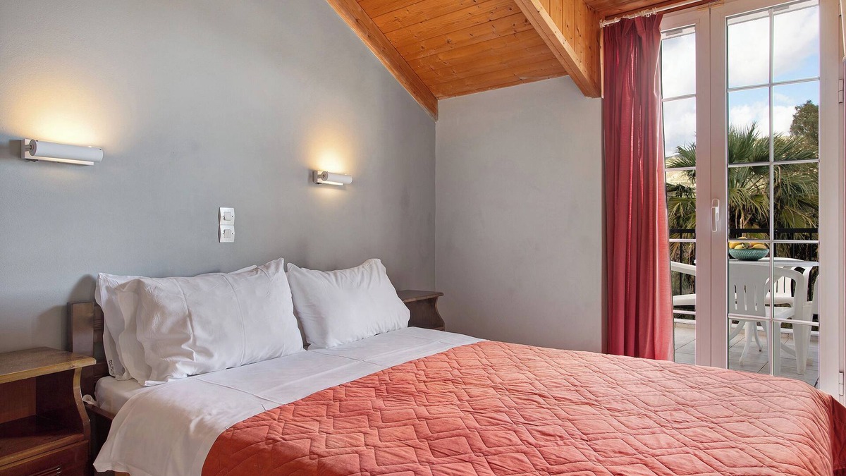 Limni Keri Apartment | Apartment "Dolphin Apartment Sea View 12" with Private Balcony, Shared Garden & Wi-Fi