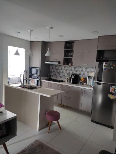 Jardim dos Passaros Apartment | Apartment in Guarujá- 10min from beach