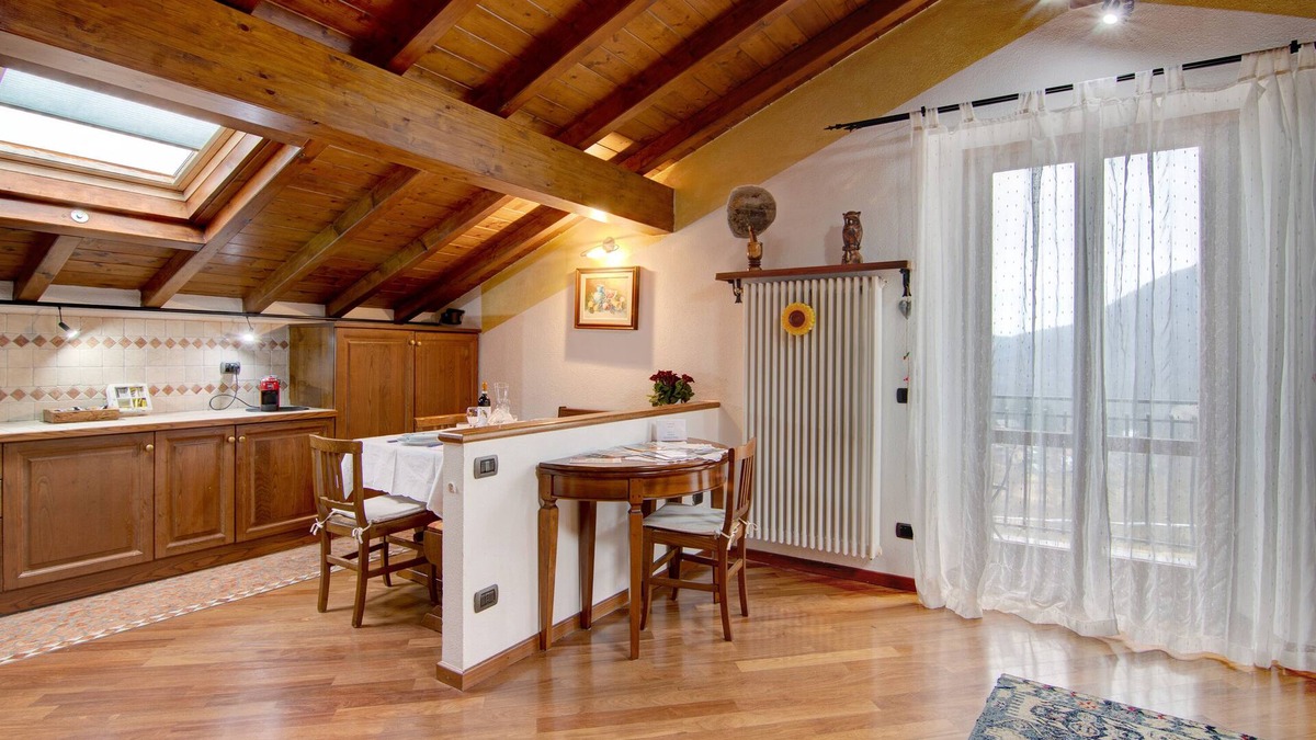 Lanzo d'Intelvi Apartment | Apartment "La Mansarda di Eros e Tiziana" with Mountain View, Shared Garden & Wi-Fi