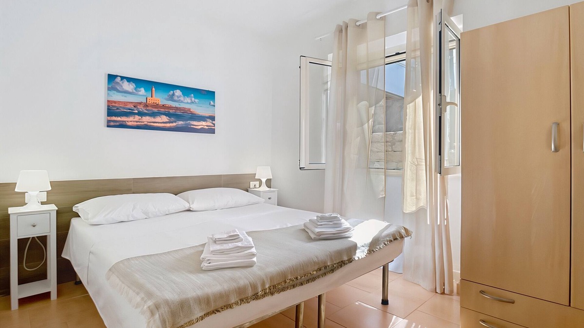 Montincello Apartment | Apartment 'La Mignola - Quadri 6' with Private Terrace, Wi-Fi and Air Conditioning