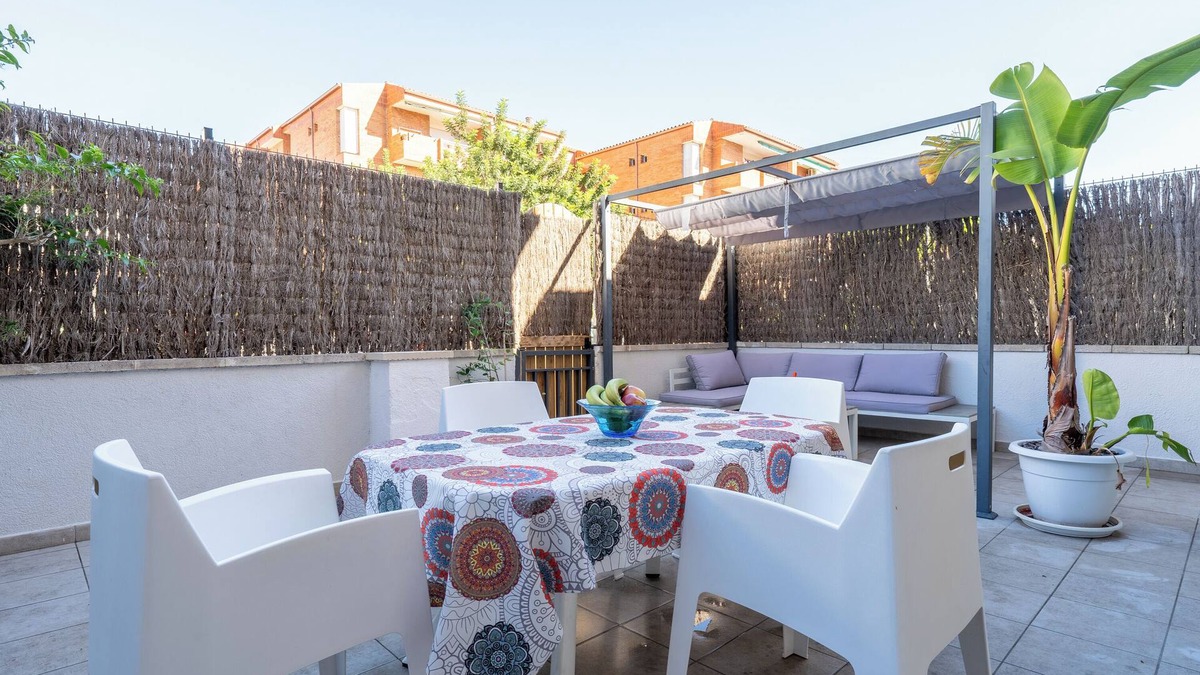 Comarruga Apartment | Apartment 'Near Beaches Large Private Patio' with Shared Pool, Wi-Fi and Air Conditioning