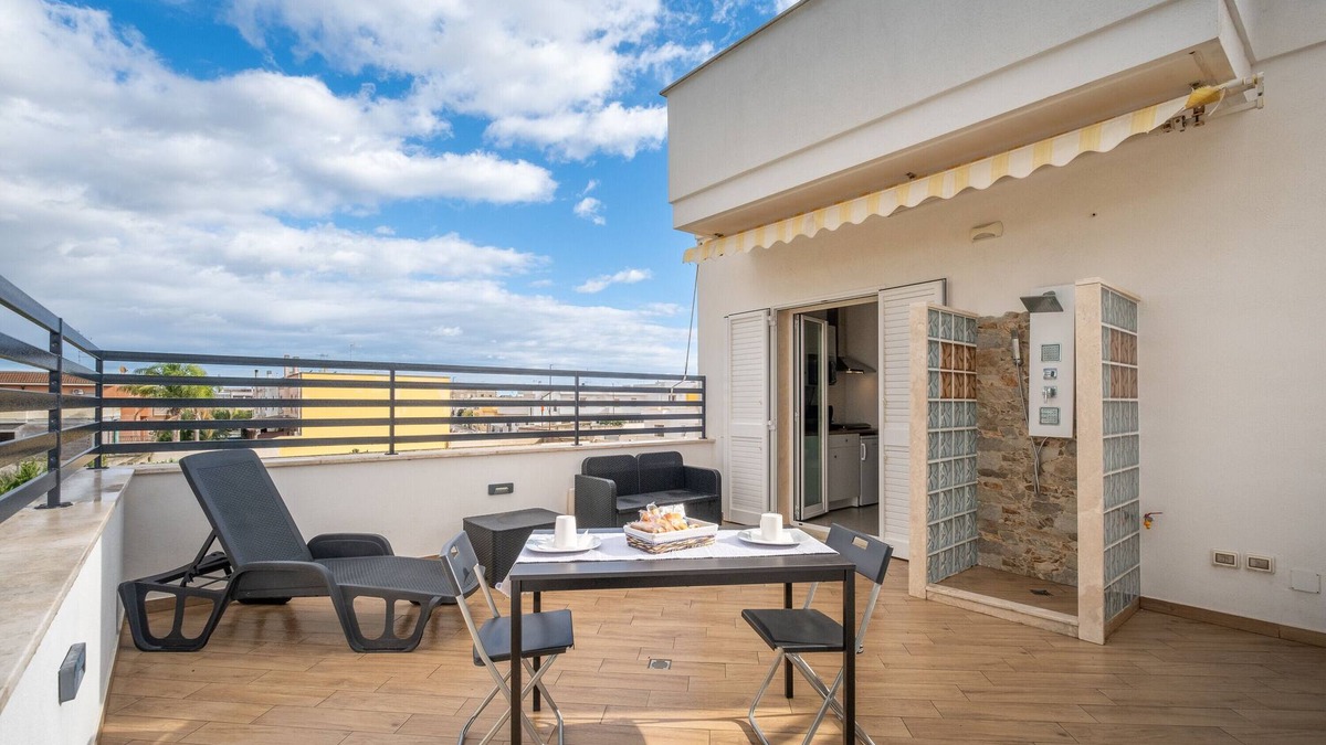 Copertino Apartment | Apartment 'Over The Top - Lu Ientu' with Private Terrace, Wi-Fi and Air Conditioning