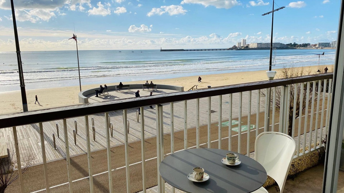 Les Sables d'Olonne Apartment | Apartment with direct beach access, balcony, and private garage