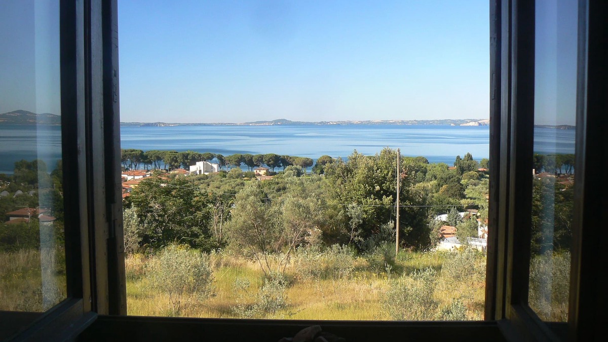 Bolsena Apartment | Apartment with garden for 4 people with beautiful lake view and convenient parking