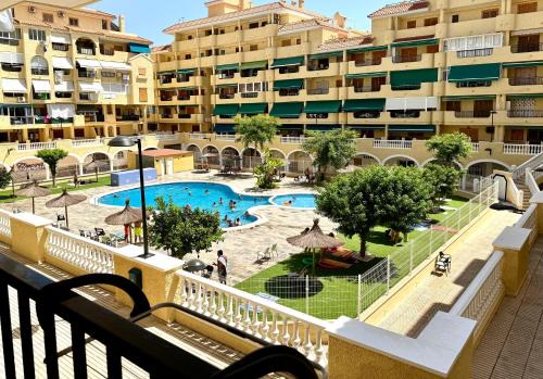 La Mata Apartment | Apartment ZuMiFra with swimming pool, 300 m from the sea, with beautiful sandy beach La Mata